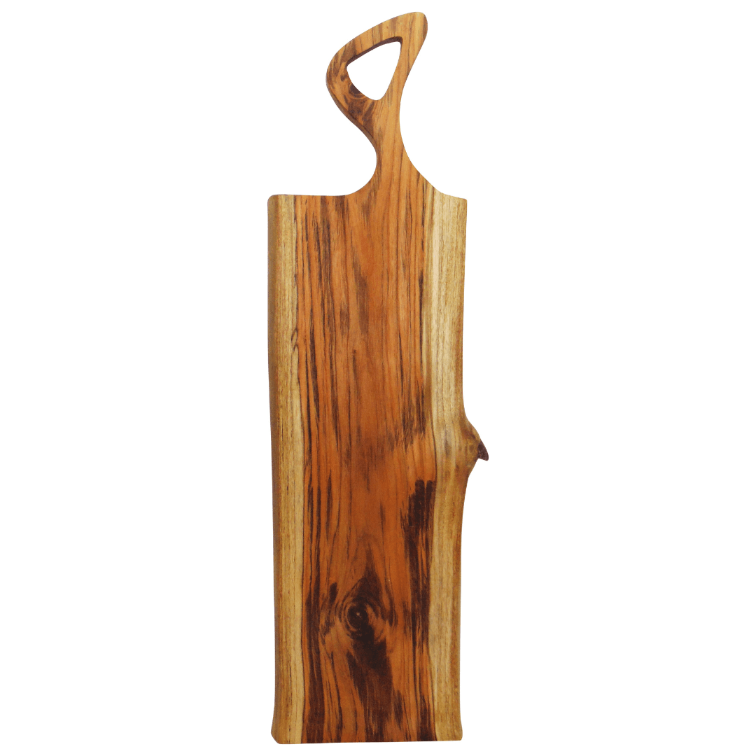 Long teak serving board with a natural edge and a sculpted cut-out handle
