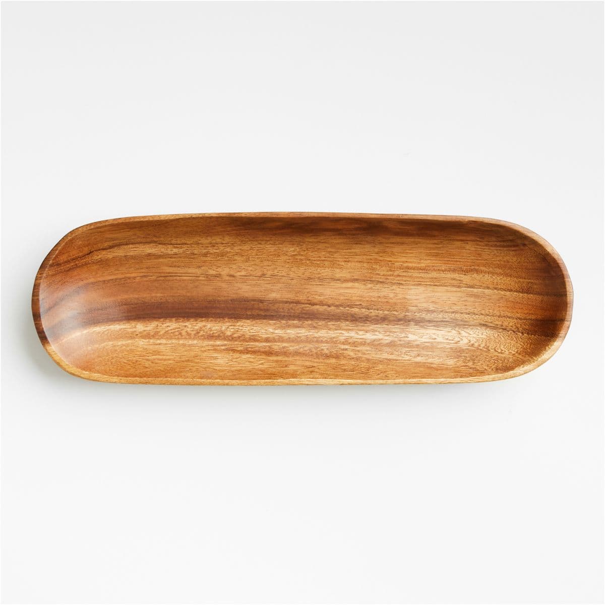 Long narrow acacia serving platter with a shallow rim and rounded ends